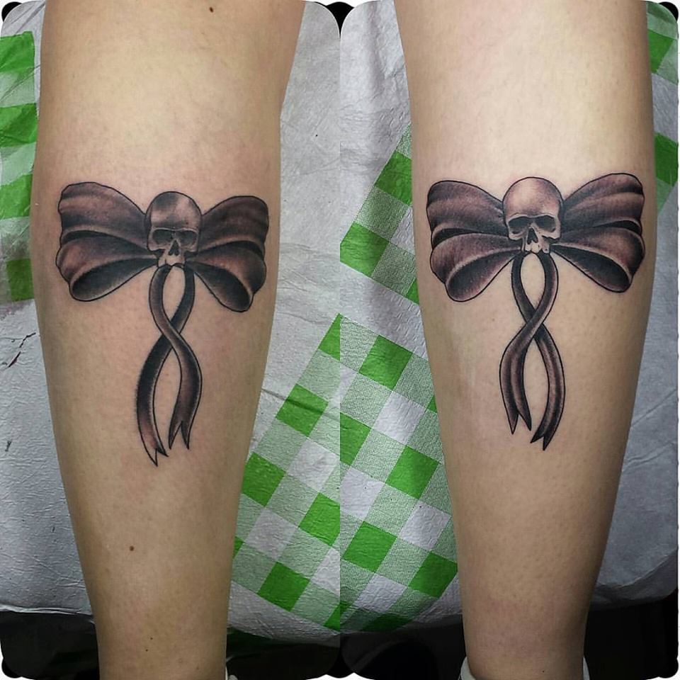 Black ribbon tattoo meaning